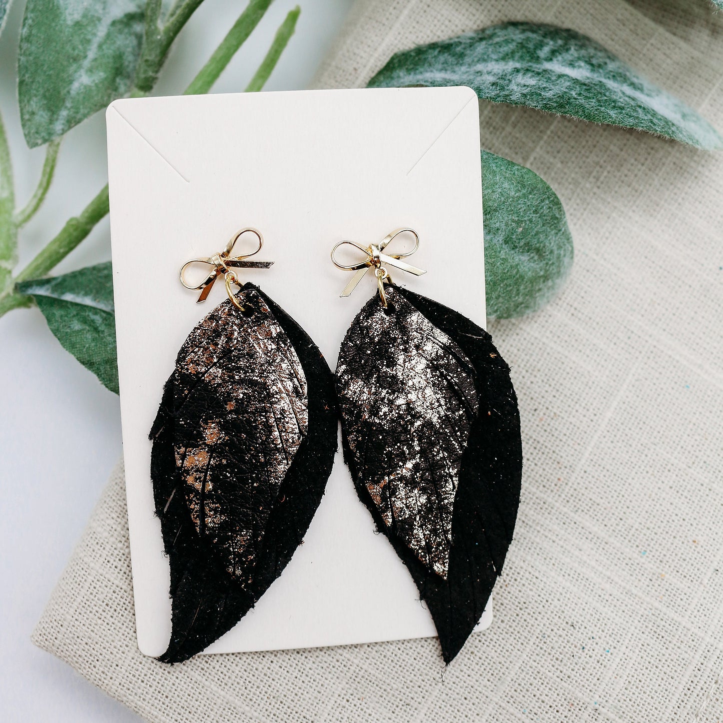 Golden Glamour: Metallic Leather Feather Earrings with Gold Bow Post