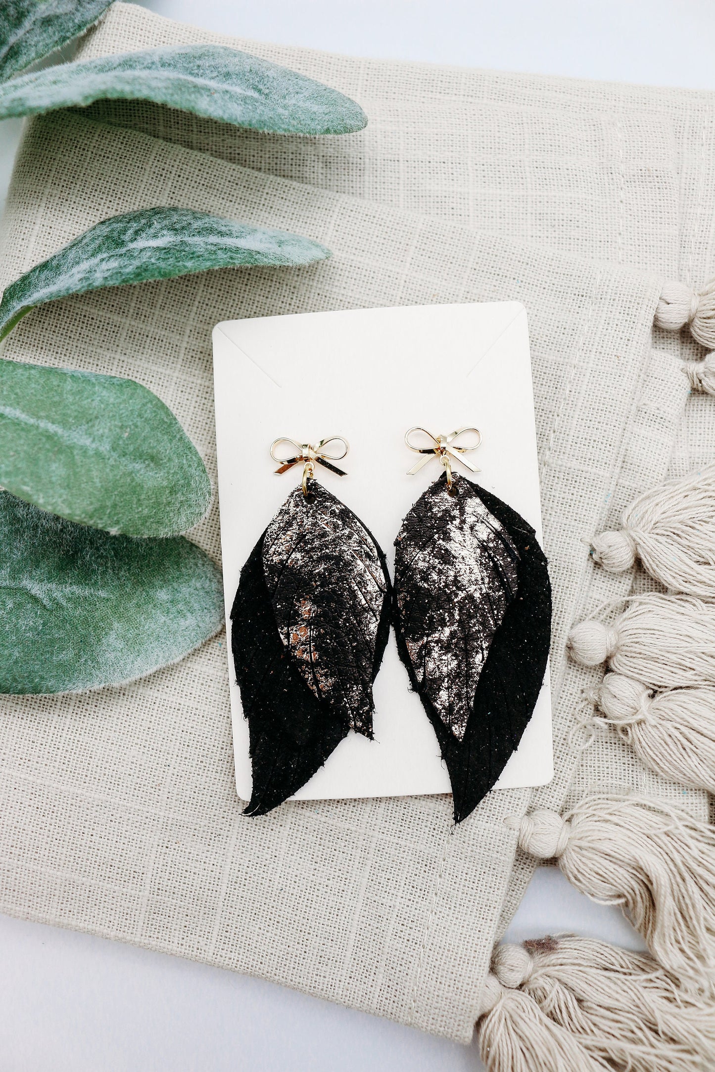 Golden Glamour: Metallic Leather Feather Earrings with Gold Bow Post