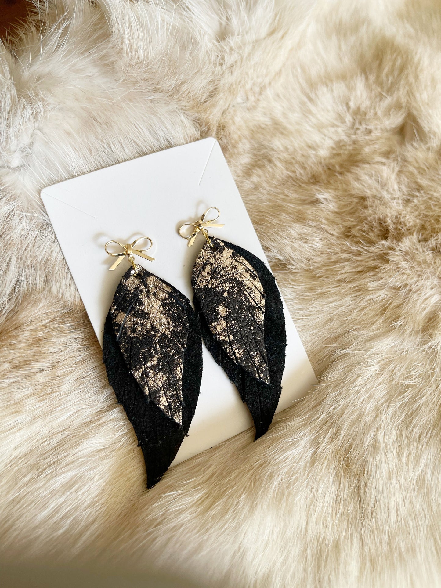 Golden Glamour: Metallic Leather Feather Earrings with Gold Bow Post